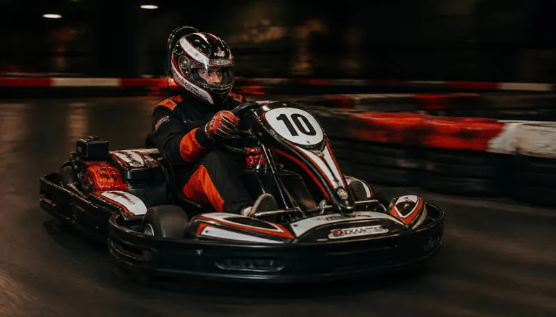 Karts racing at an Art of Kart event